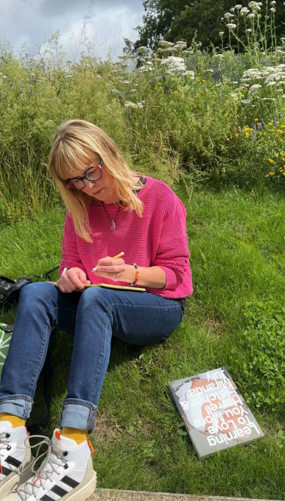 Meg journalling in nature